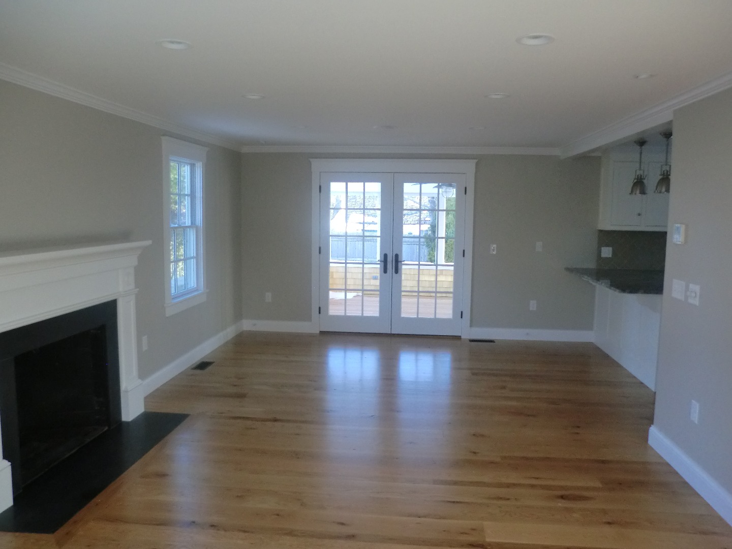 114 South Summer Street Edgartown, MA 02539 - Photo 50 of 102 a view of an empty room with wooden floor and a window