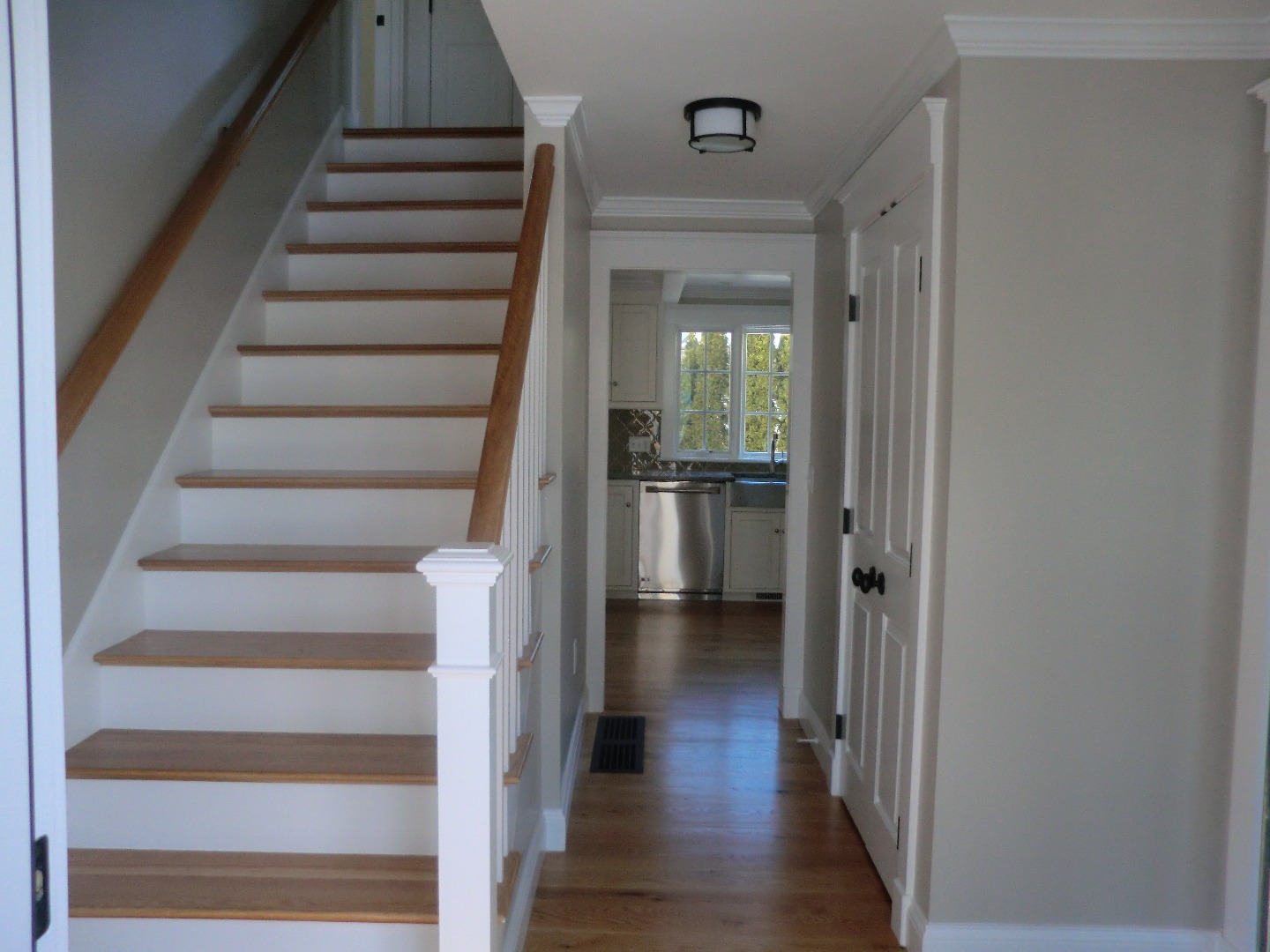 114 South Summer Street Edgartown, MA 02539 - Photo 55 of 102 a view of a hallway with wooden floor and entryway