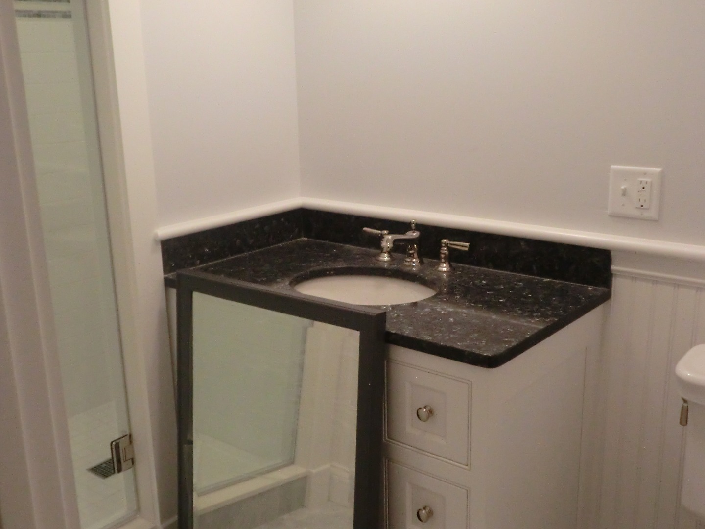114 South Summer Street Edgartown, MA 02539 - Photo 64 of 102 a bathroom with a granite countertop sink and a mirror