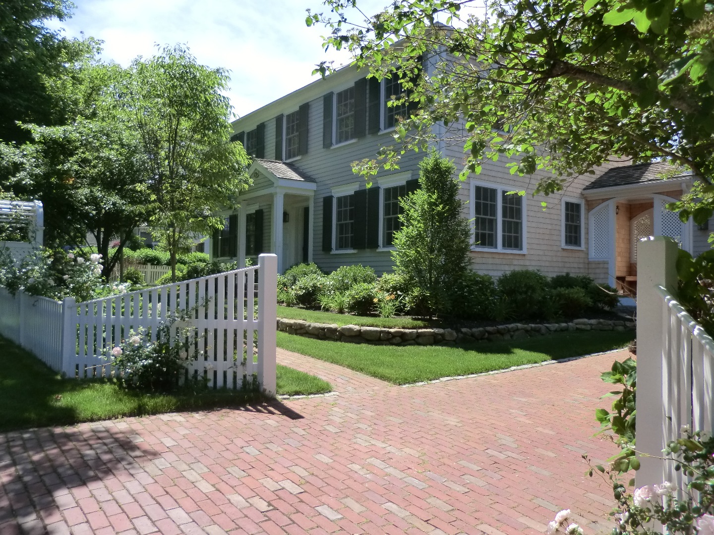 114 South Summer Street Edgartown, MA 02539 - Photo 97 of 102 a front view of a house with garden