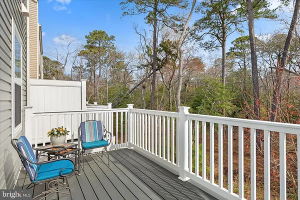 a view of a wooden fence