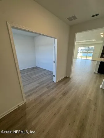 a view of a livingroom with furniture and a window