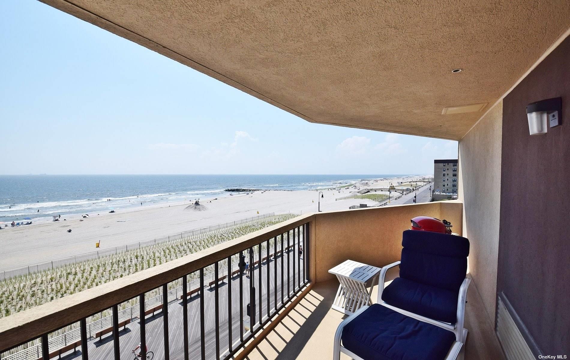 360 Shore Road, Unit 5E Long Beach, NY 11561 - Photo 8 of 21 a balcony with an ocean view