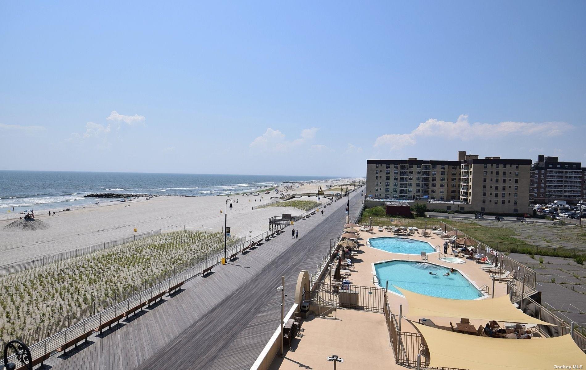 360 Shore Road, Unit 5E Long Beach, NY 11561 - Photo 9 of 21 a view of a balcony with an ocean view
