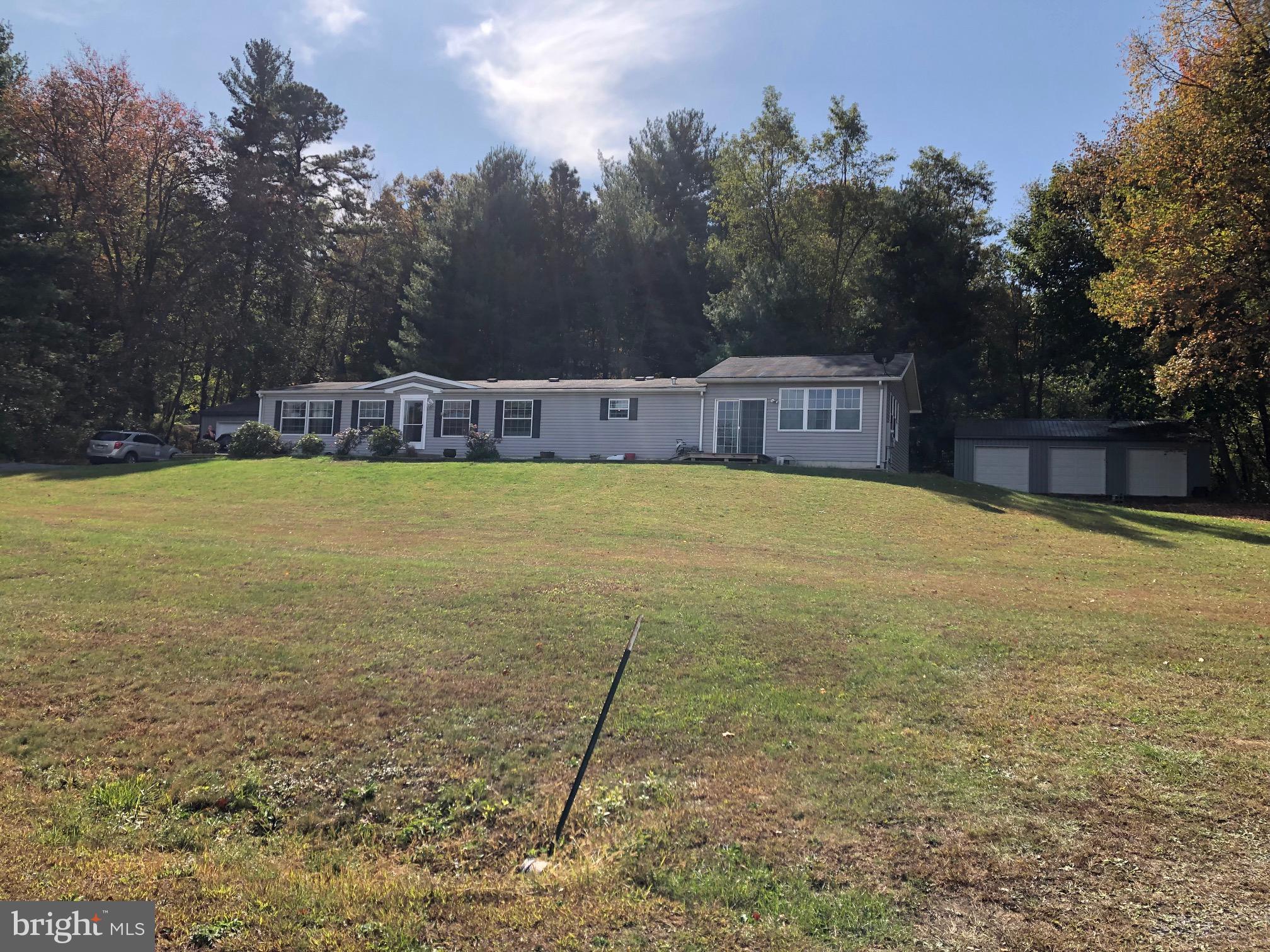 60 Mt Union Road Fayetteville, PA 17222 - Photo 2 of 36 View of home & garage 2 on right.