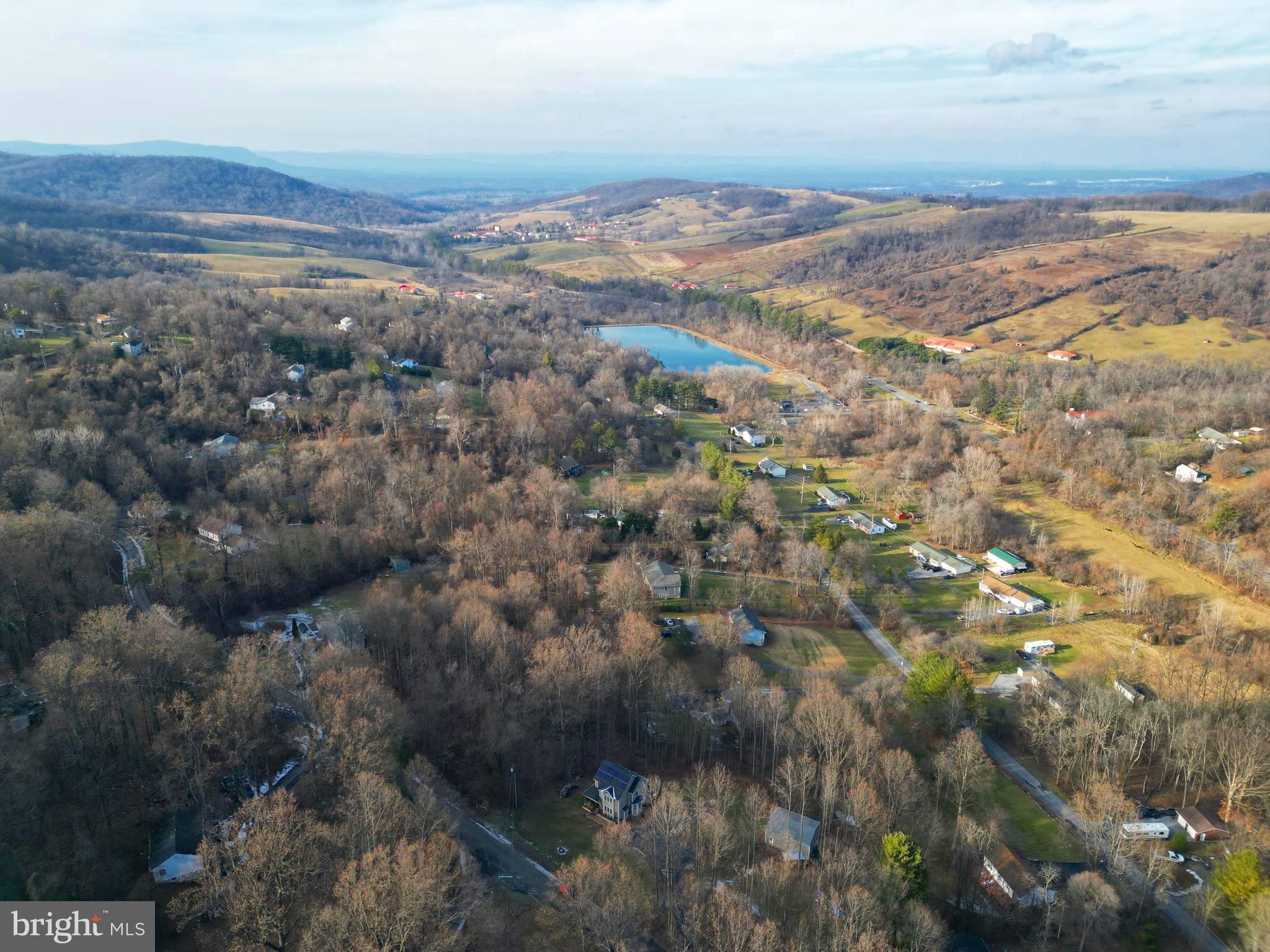 a view of mountain and an ocean