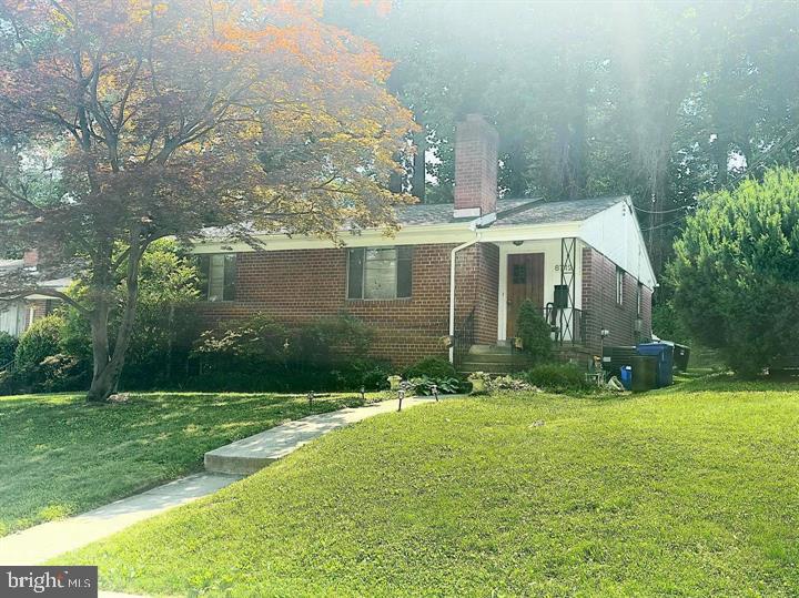 8712 Sundale Drive Silver Spring, MD 20910 - Photo 2 of 2 a front view of house with yard and green space