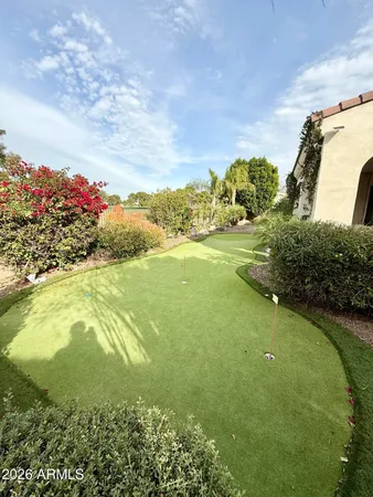 a view of an ocean and a yard