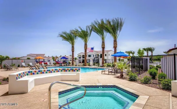 a view of a swimming pool and a terrace