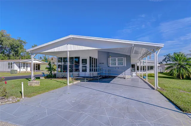 a view of house with outdoor entertaining spaces