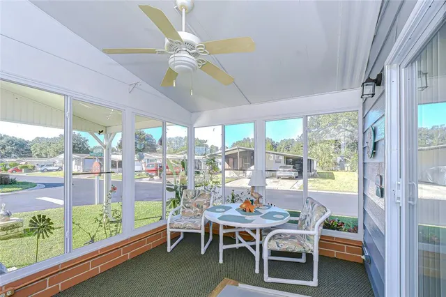 a outdoor dining room with furniture window and outdoor view