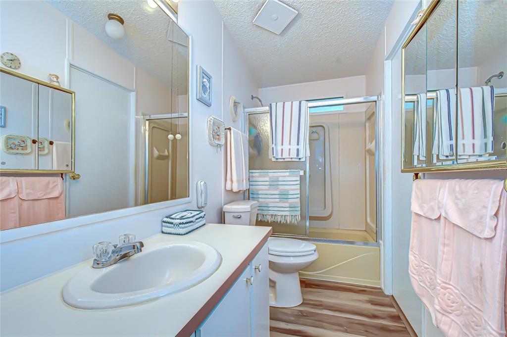 3210 Moonlight Street Wesley Chapel, FL 33543 - Photo 34 of 49 a bathroom with a sink toilet and shower