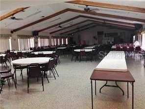 3210 Moonlight Street Wesley Chapel, FL 33543 - Photo 45 of 49 a view of a dining room with furniture