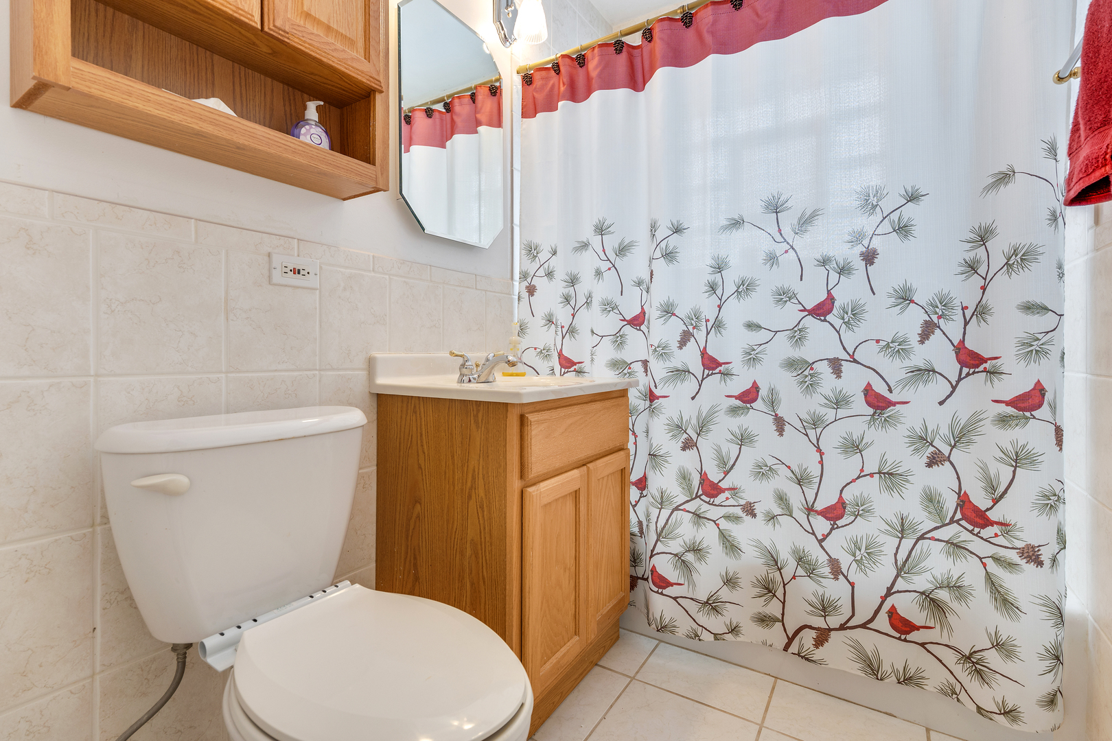 14305 Kostner Avenue Midlothian, IL 60445 - Photo 13 of 22 a white toilet sitting next to a shower curtain