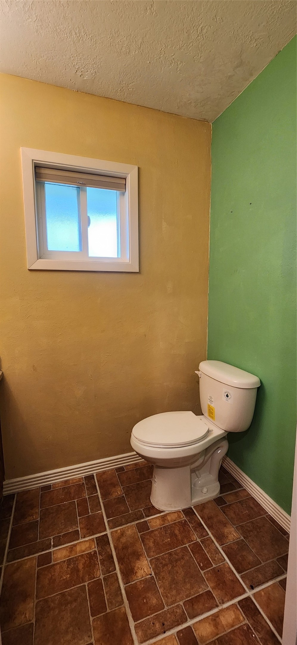 616 Cannan Drive Angleton, TX 77515 - Photo 13 of 44 a bathroom with a toilet and a sink