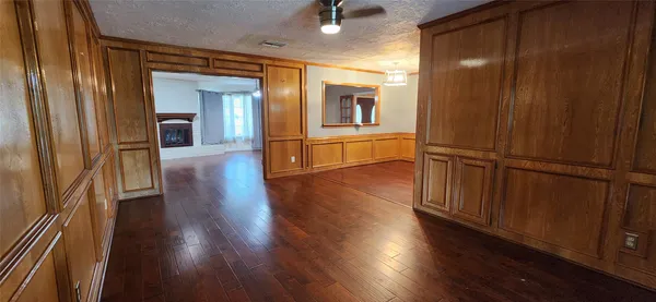 a view of a livingroom with wooden floor