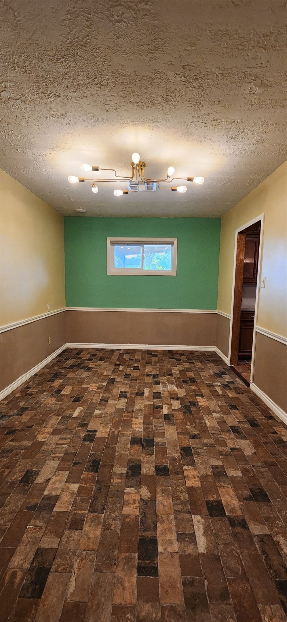 616 Cannan Drive Angleton, TX 77515 - Photo 22 of 44 an empty room with a fireplace and painted walls