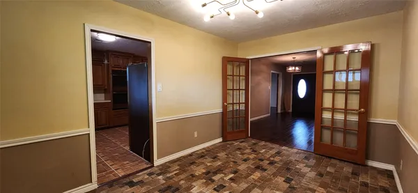 an view of entryway with wooden floor