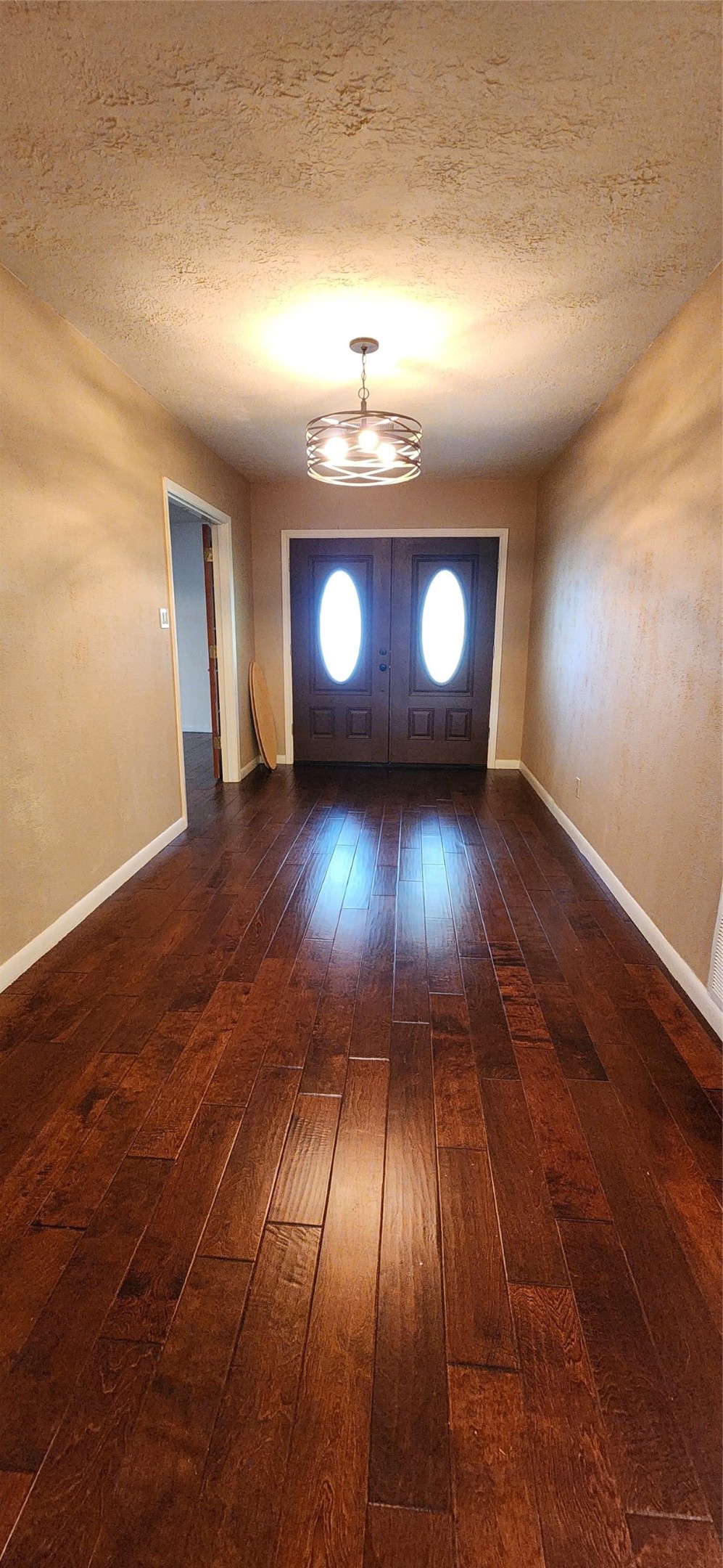 616 Cannan Drive Angleton, TX 77515 - Photo 24 of 44 an view of entryway with wooden floor