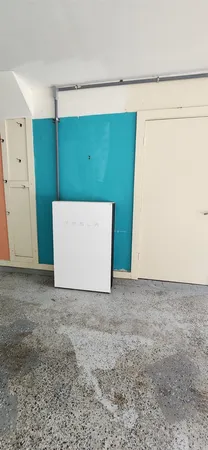 a view of a refrigerator and window