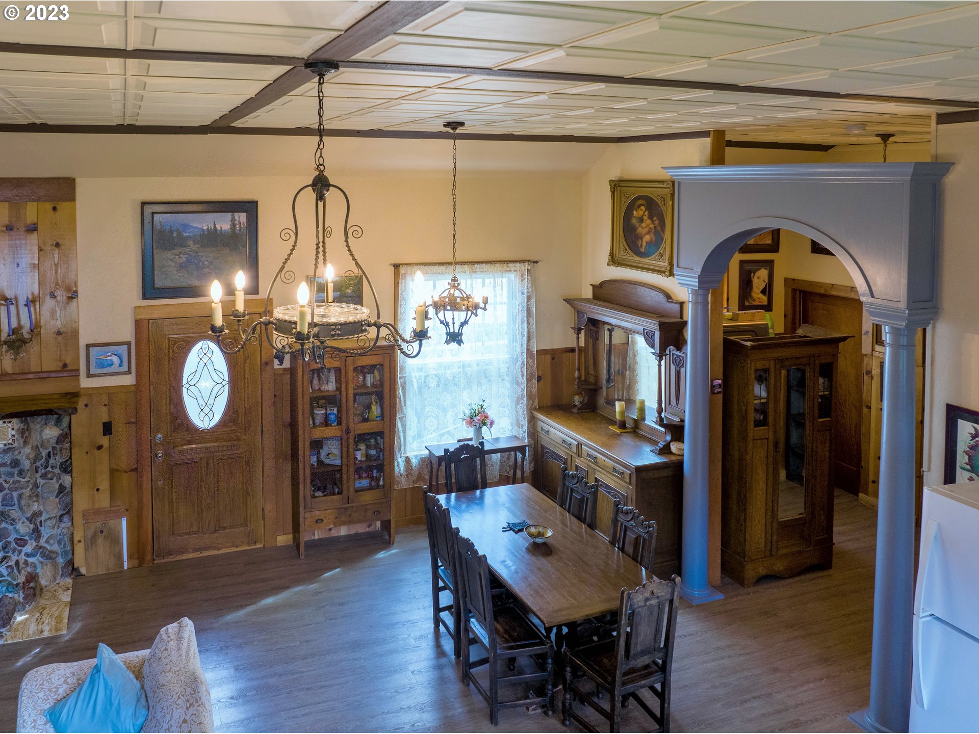 174 North 20th Street Reedsport, OR 97467 - Photo 13 of 43 a view of a dining room with furniture and chandelier