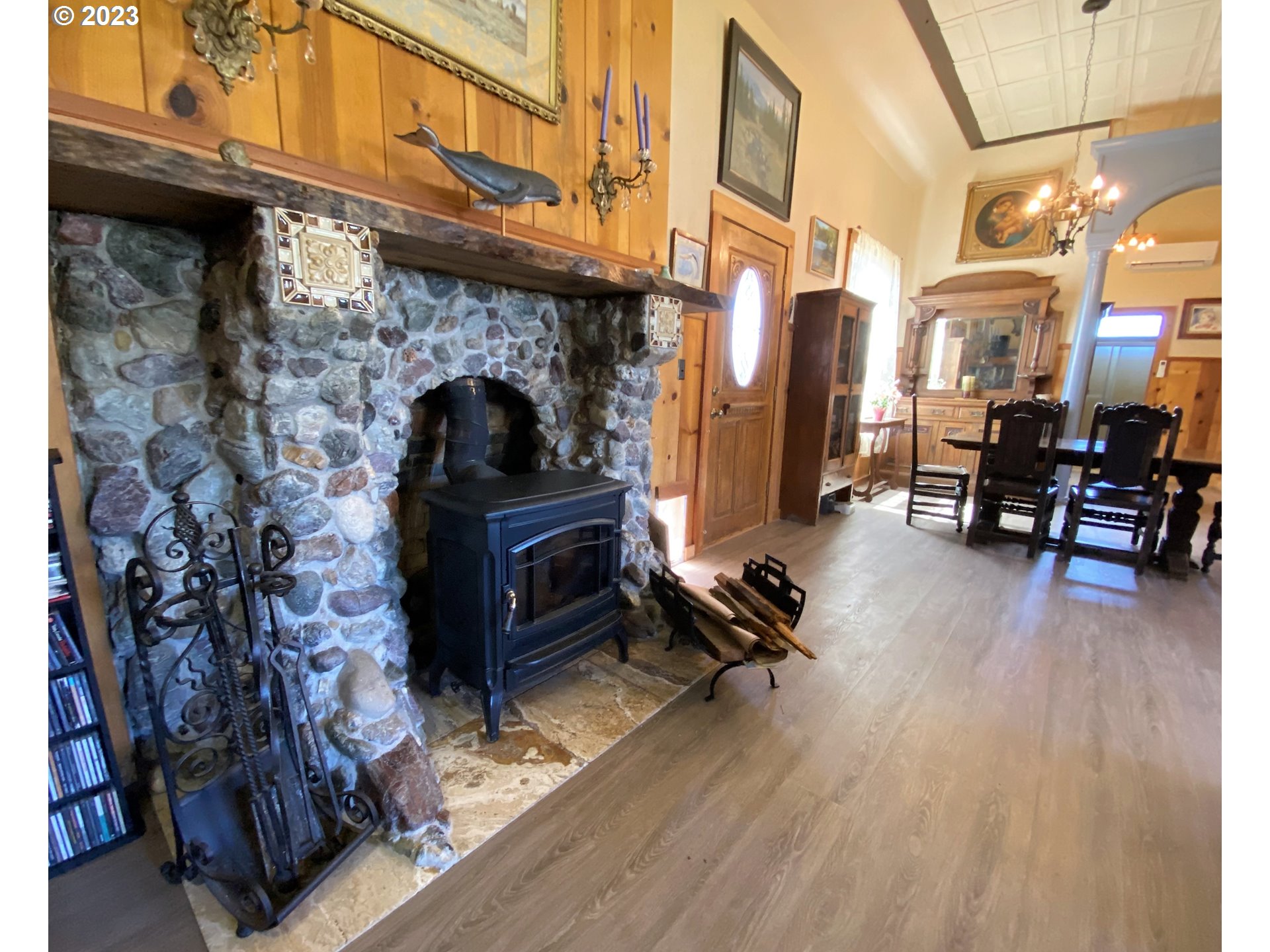 174 North 20th Street Reedsport, OR 97467 - Photo 15 of 43 a living room with fireplace furniture and a fireplace