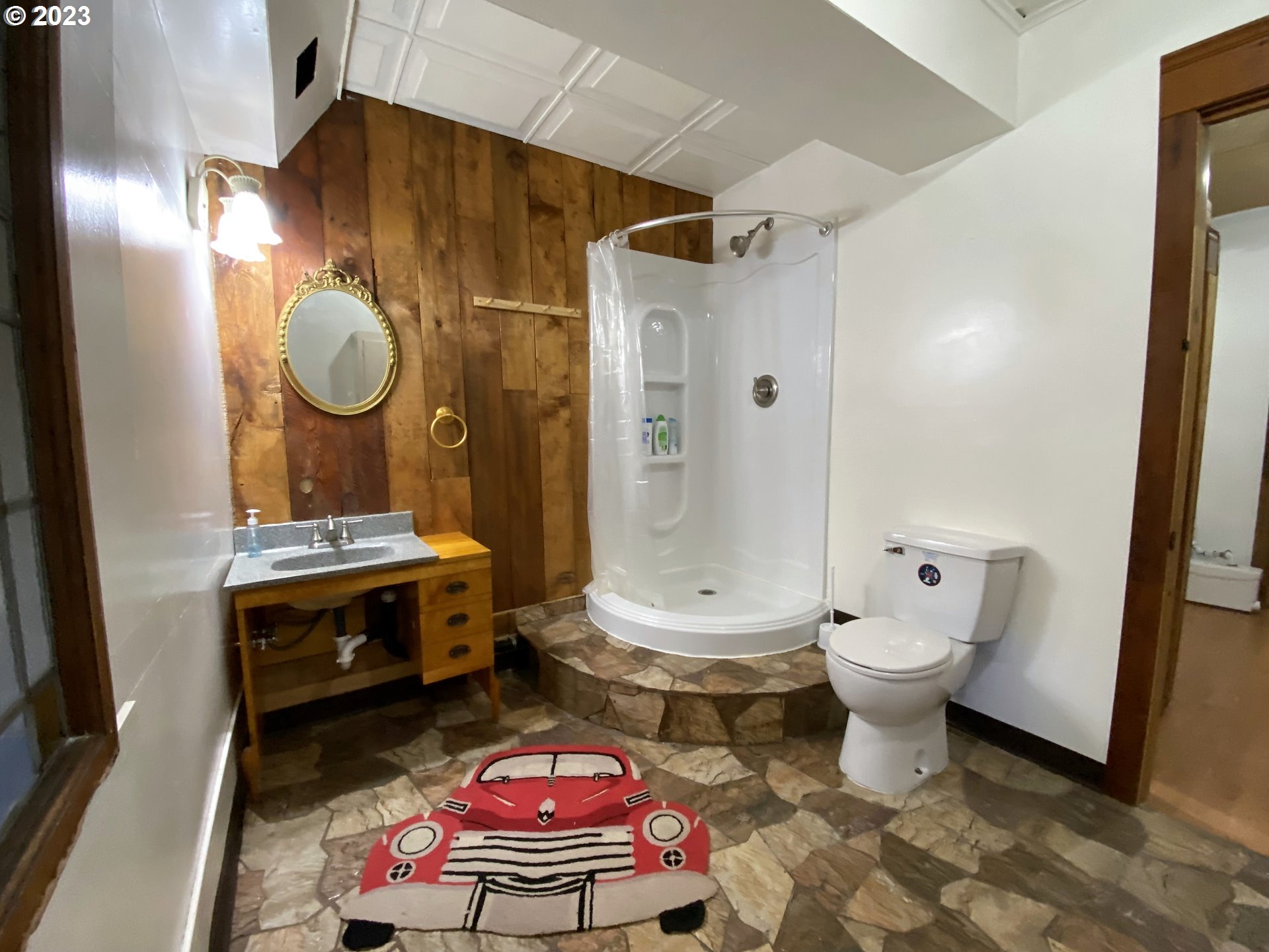 174 North 20th Street Reedsport, OR 97467 - Photo 35 of 43 a bathroom with a sink toilet and shower