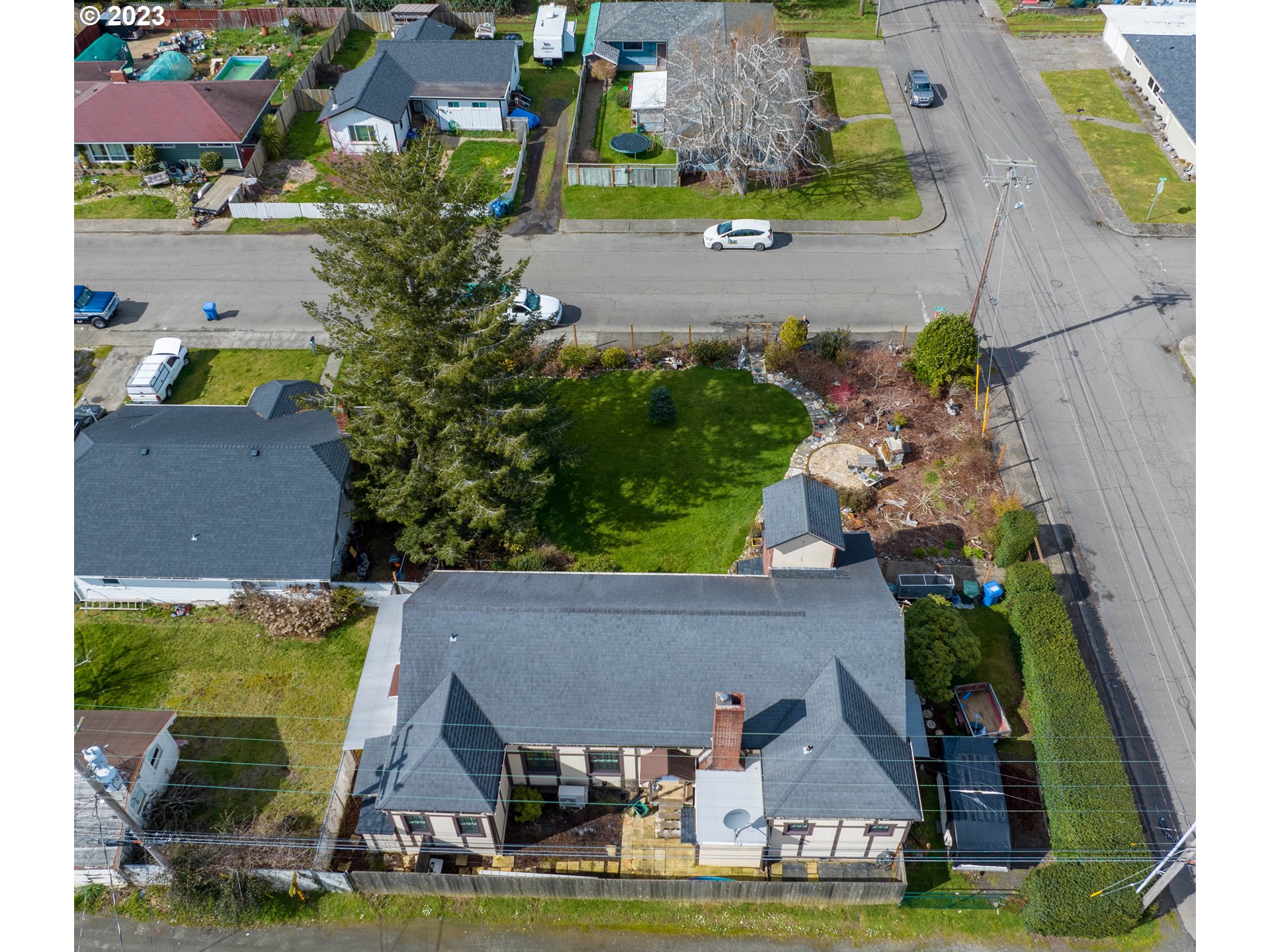 174 North 20th Street Reedsport, OR 97467 - Photo 5 of 43 an aerial view of residential houses with outdoor space