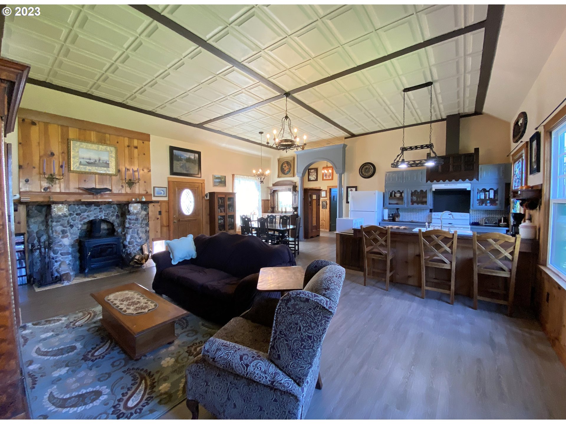 174 North 20th Street Reedsport, OR 97467 - Photo 9 of 43 a living room with furniture and a fireplace