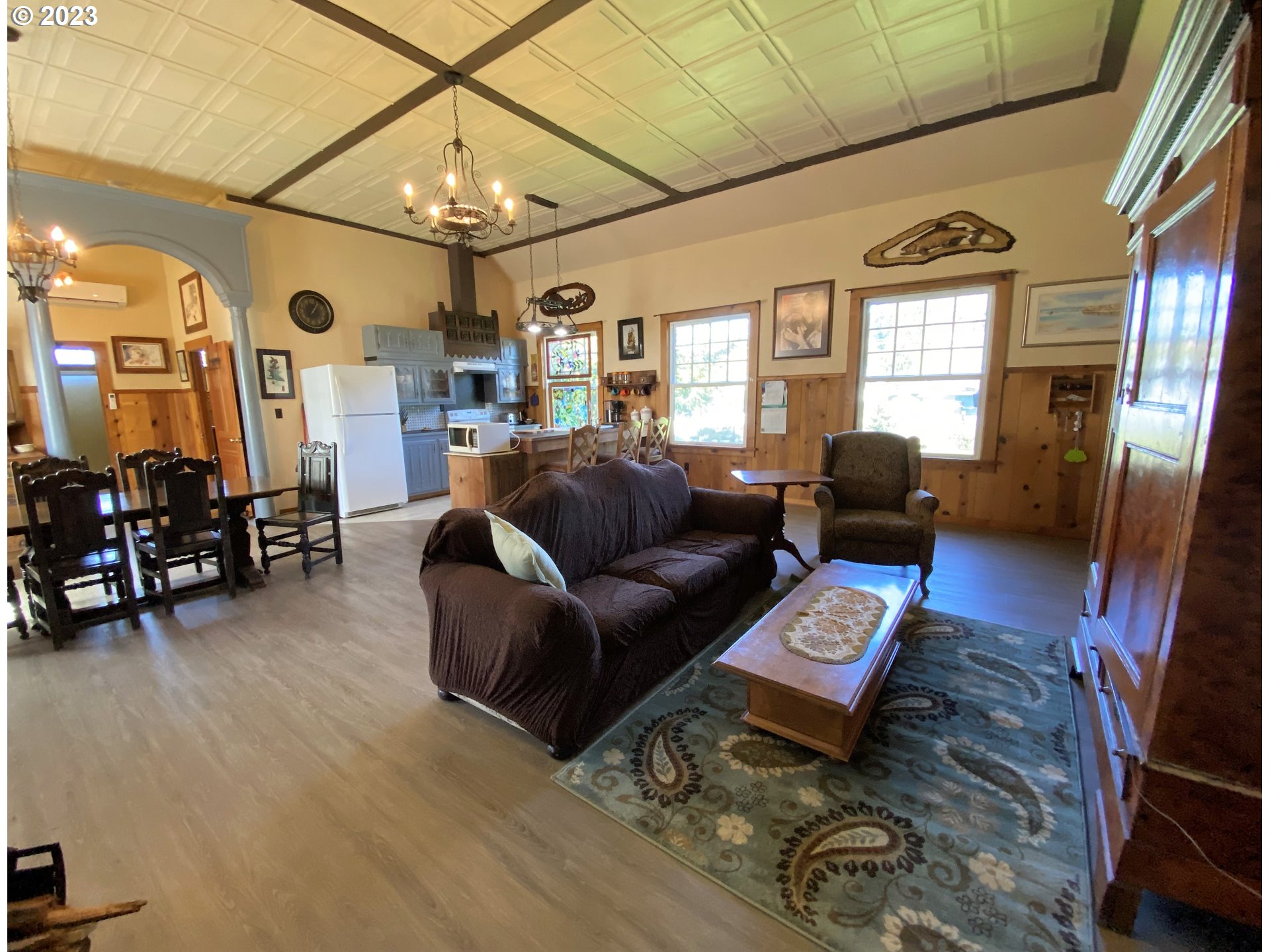 174 North 20th Street Reedsport, OR 97467 - Photo 10 of 43 a living room with furniture and wooden floor
