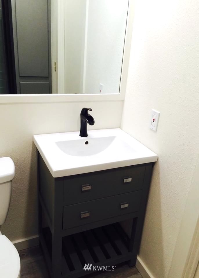 1276 Atterberry Road Sequim, WA 98382 - Photo 14 of 28 a bathroom with a sink and a toilet