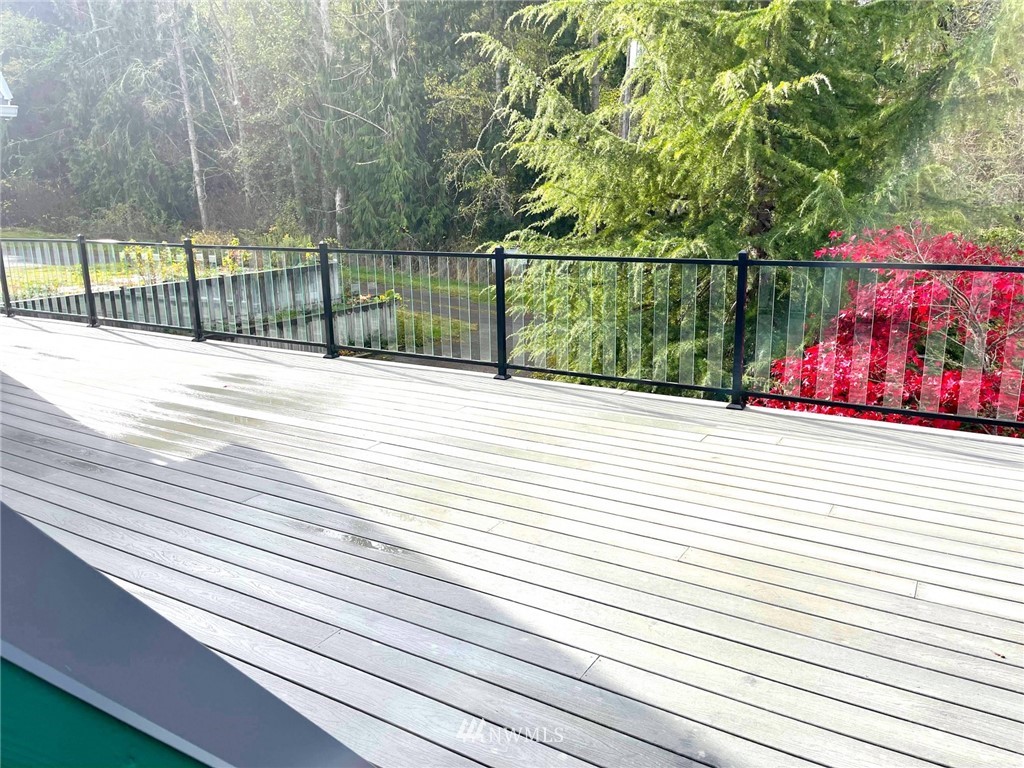 1276 Atterberry Road Sequim, WA 98382 - Photo 6 of 28 a view of a terrace with a bench