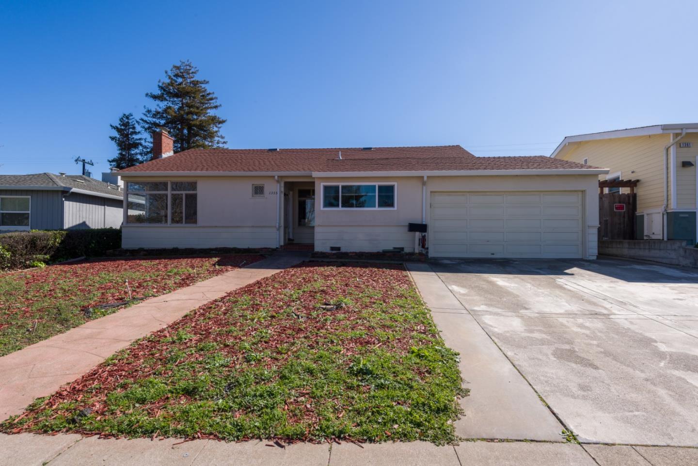 1355 Hillcrest Boulevard Millbrae, CA 94030 - Photo 1 of 17 front view of a house with a yard