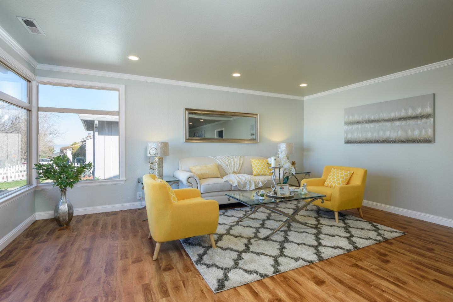 1355 Hillcrest Boulevard Millbrae, CA 94030 - Photo 3 of 17 a living room with furniture floor to ceiling window and wooden floor