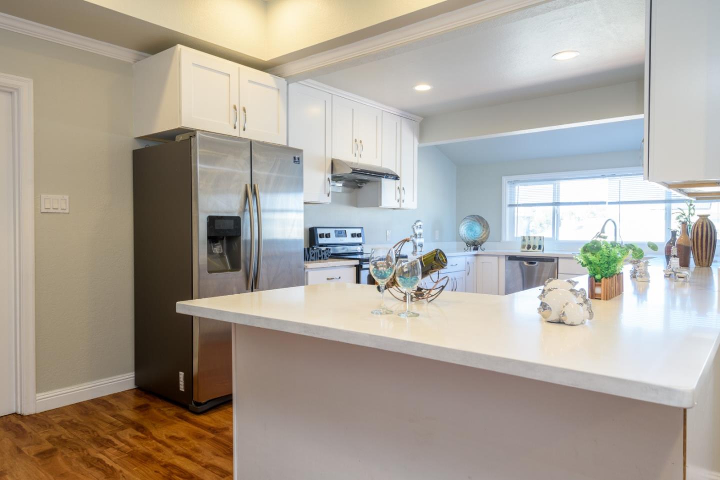 1355 Hillcrest Boulevard Millbrae, CA 94030 - Photo 5 of 17 a kitchen with refrigerator and a sink