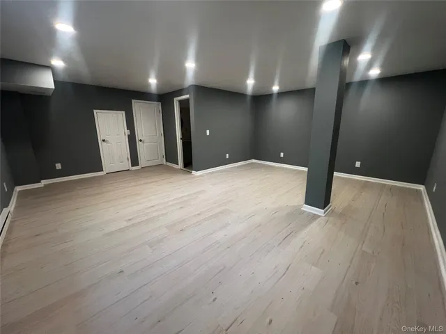 a view of a porch with wooden floor