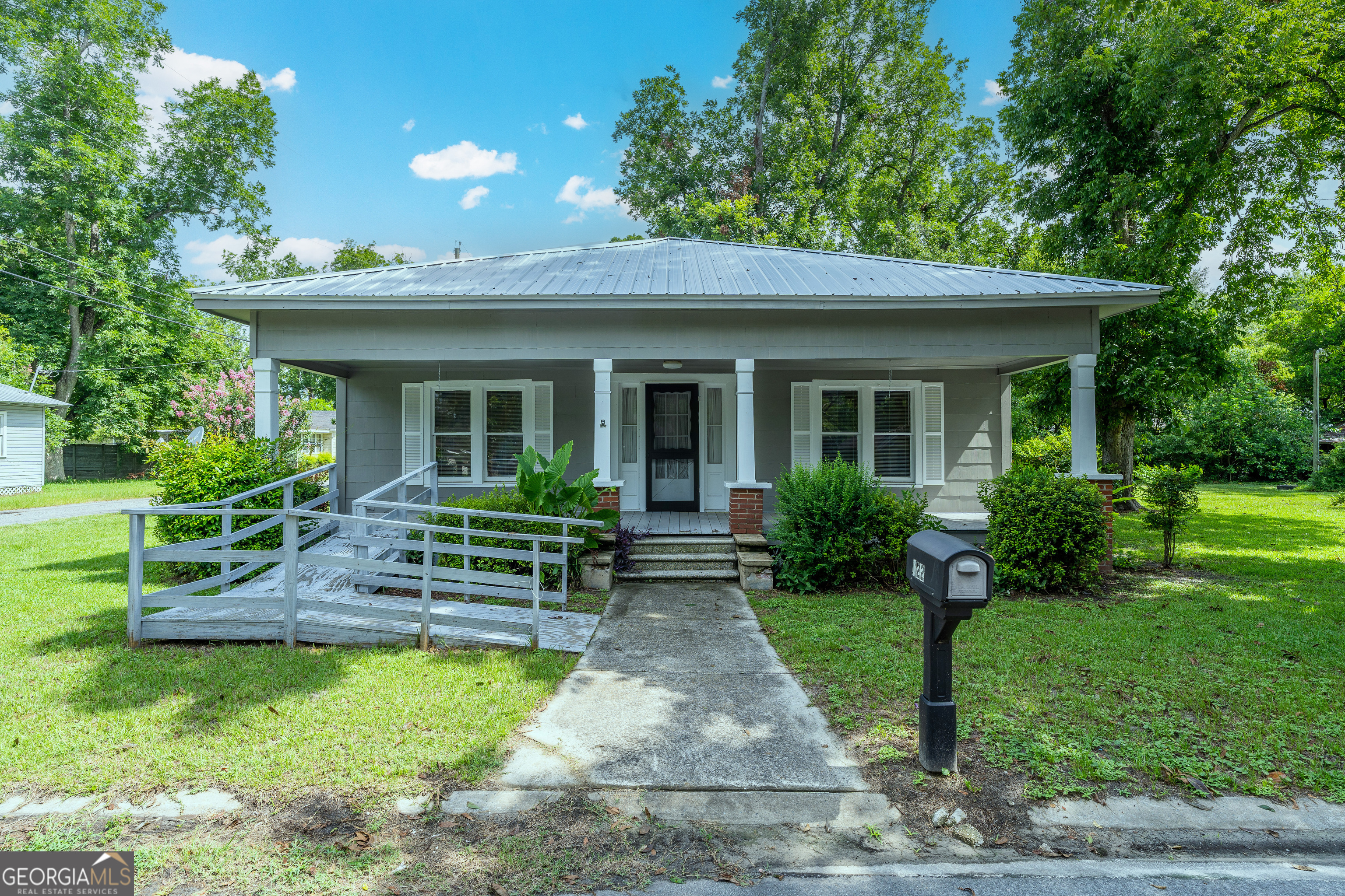 122 Hopkins Street Waycross, GA 31501 - Photo 1 of 31 a view of a house with patio