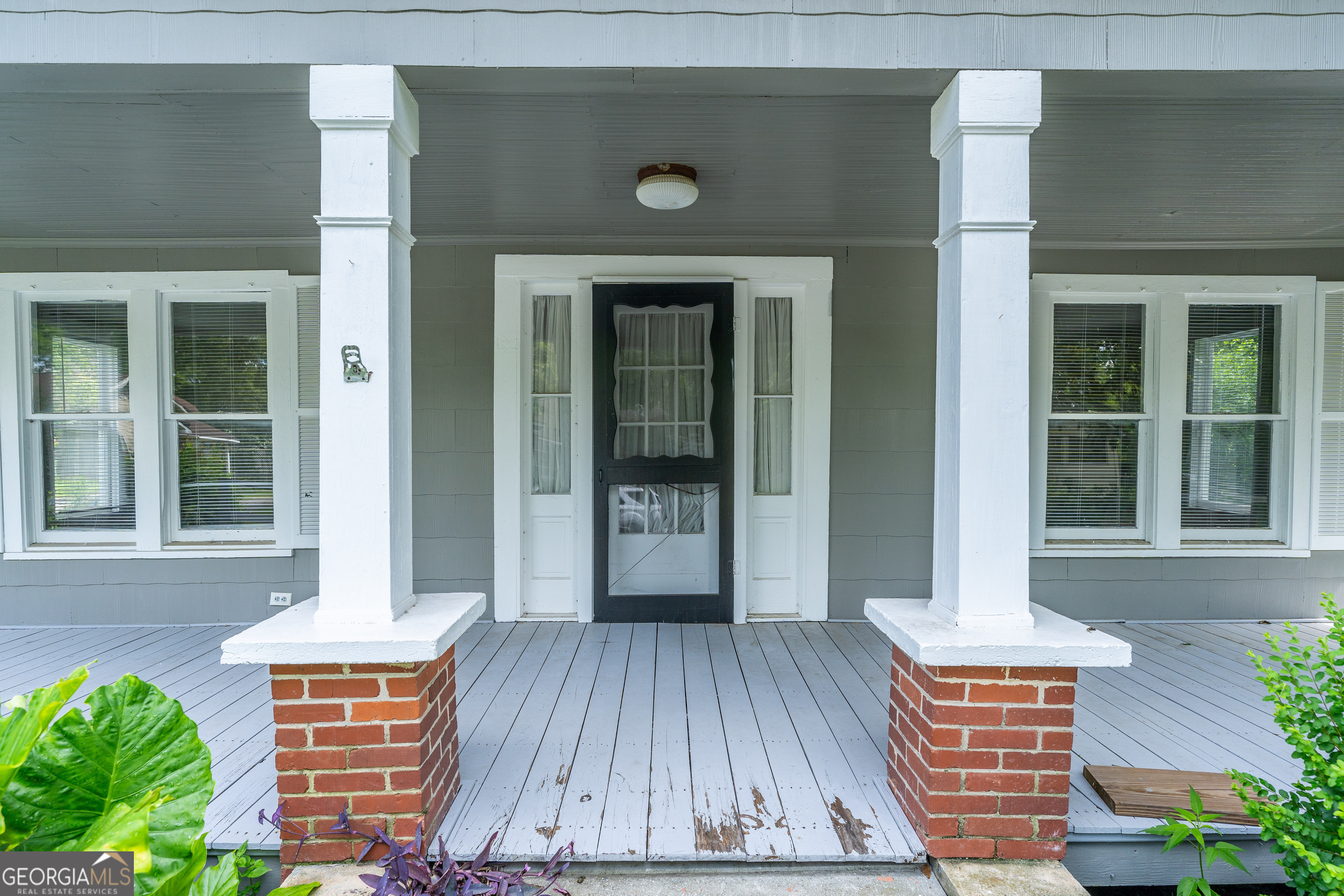 122 Hopkins Street Waycross, GA 31501 - Photo 14 of 31 a backyard of a house with seating space