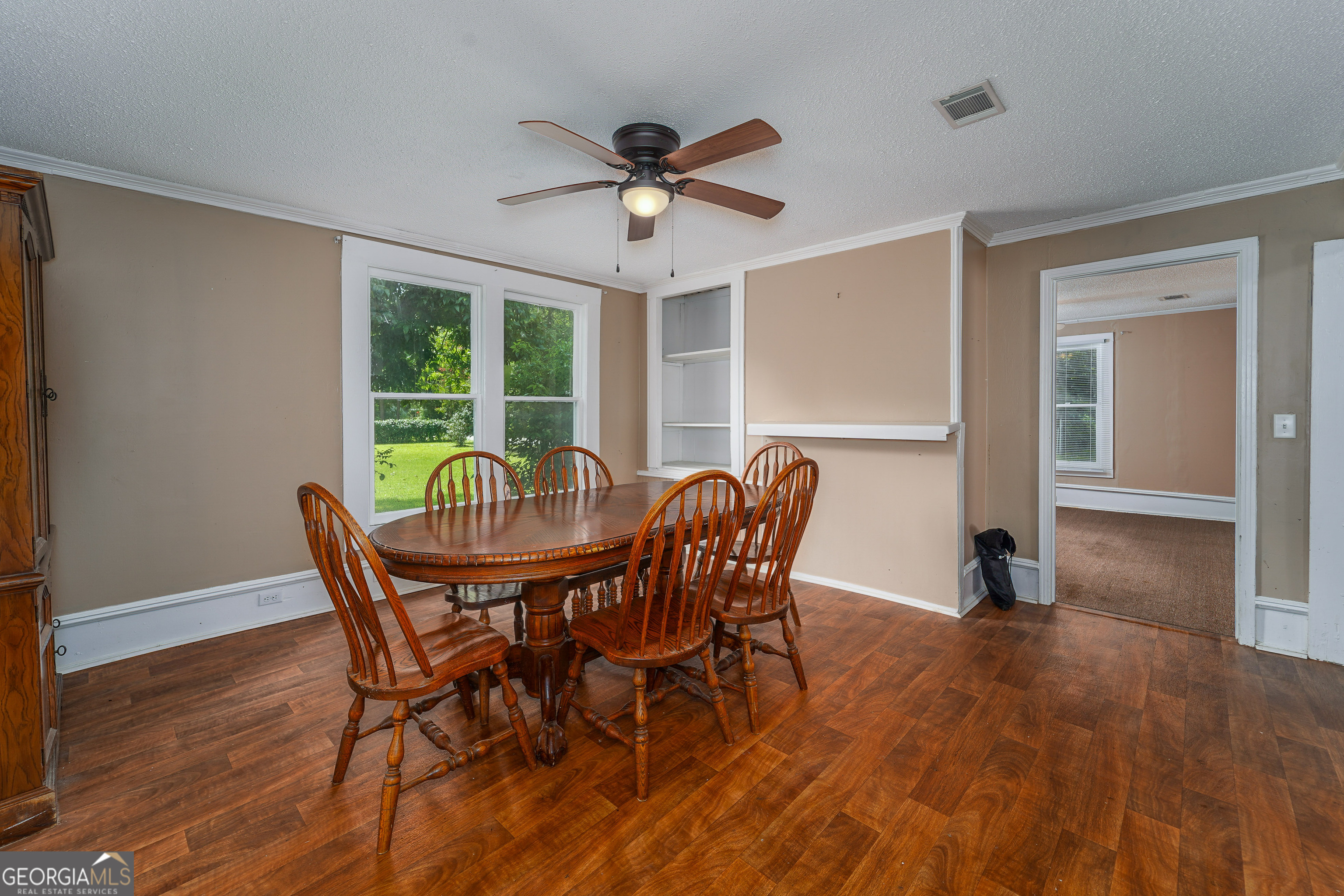 122 Hopkins Street Waycross, GA 31501 - Photo 24 of 31 a view of a dining room with furniture window and outside view