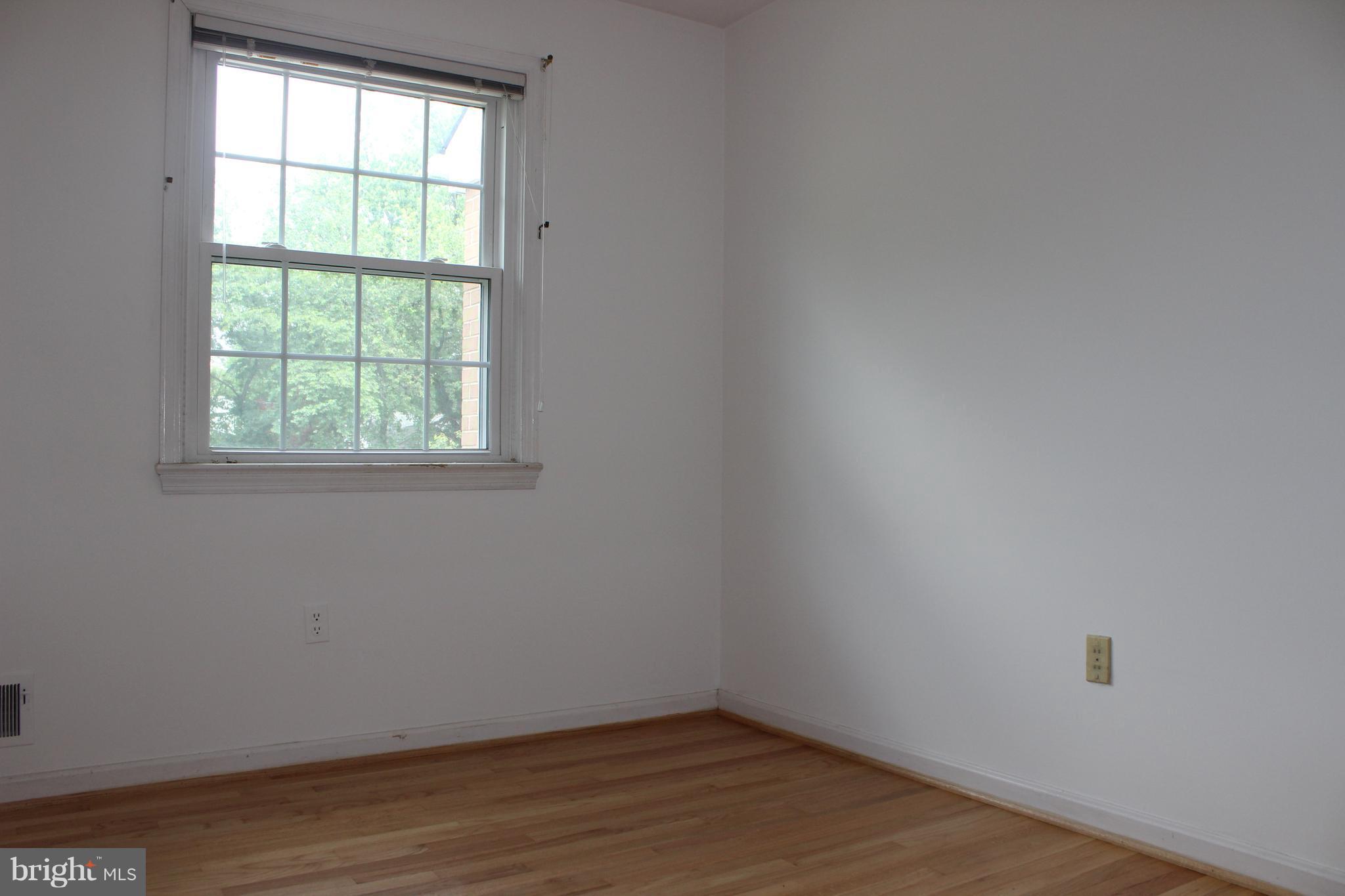 2128 Bucknell Terrace, Unit 31 Silver Spring, MD 20902 - Photo 12 of 21 3rd Bedroom with Wood Floors