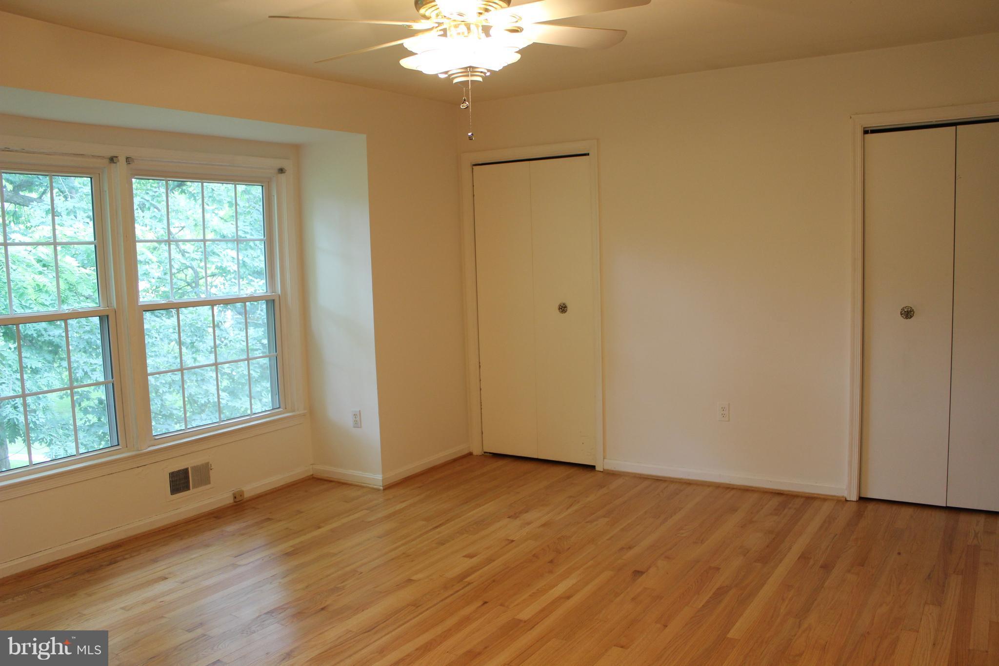 2128 Bucknell Terrace, Unit 31 Silver Spring, MD 20902 - Photo 8 of 21 Main Bedroom with Wood Floors
