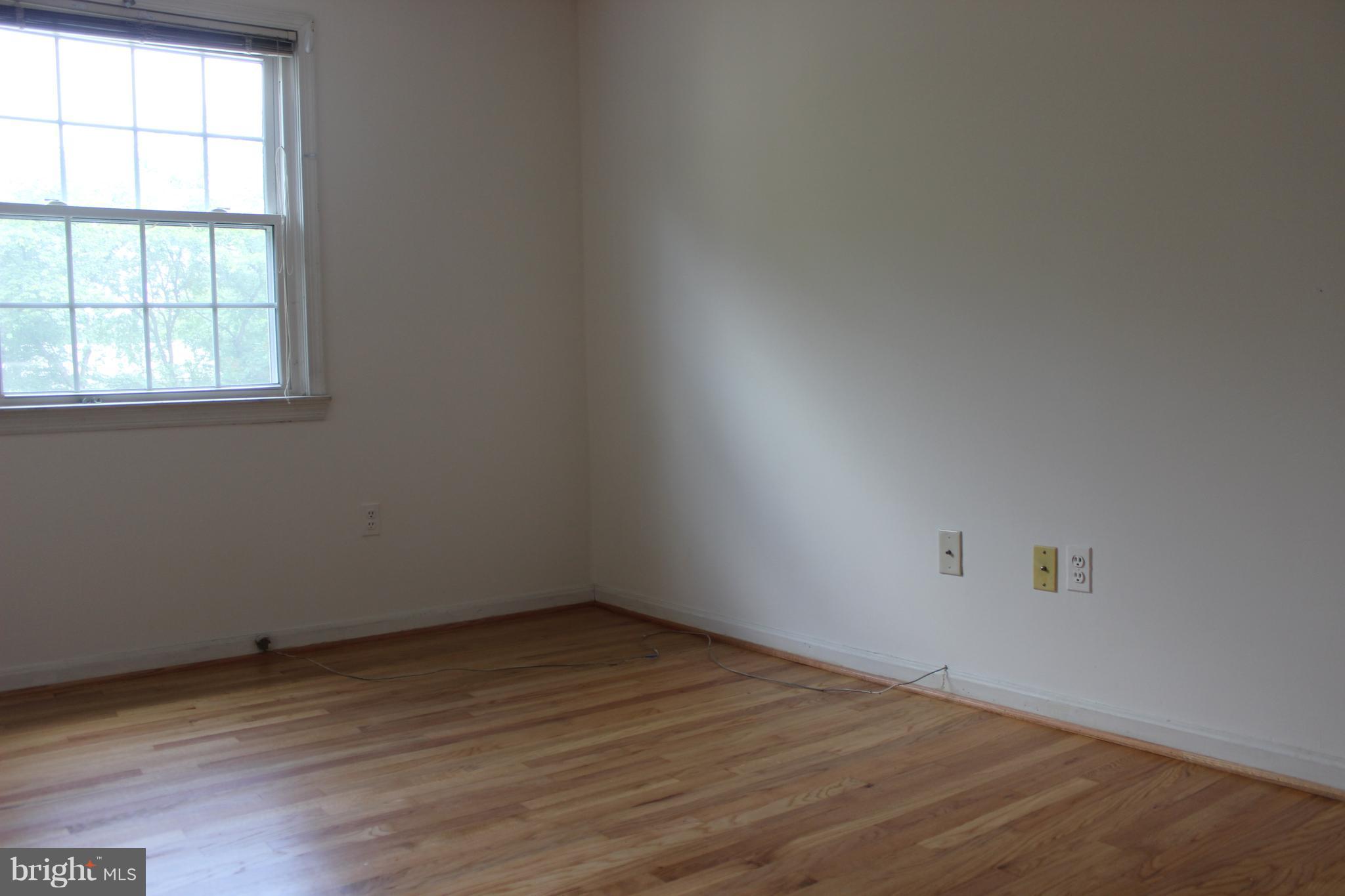 2128 Bucknell Terrace, Unit 31 Silver Spring, MD 20902 - Photo 10 of 21 2nd Bedroom with Wood Floors