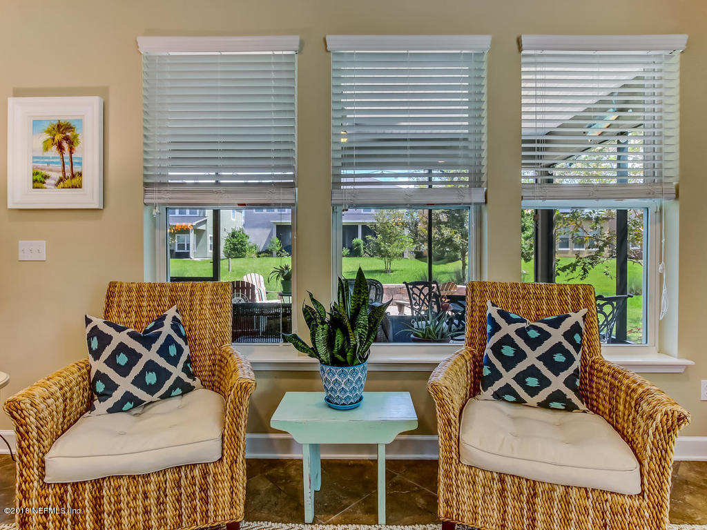 144 Maiden Terrace Ponte Vedra, FL 32081 - Photo 13 of 59 a living room with furniture and a large window