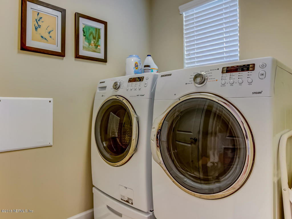 144 Maiden Terrace Ponte Vedra, FL 32081 - Photo 41 of 59 a utility room with dryer and washer