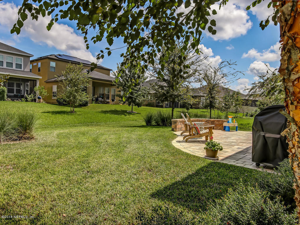 144 Maiden Terrace Ponte Vedra, FL 32081 - Photo 51 of 59 a view of a house with backyard and sitting area
