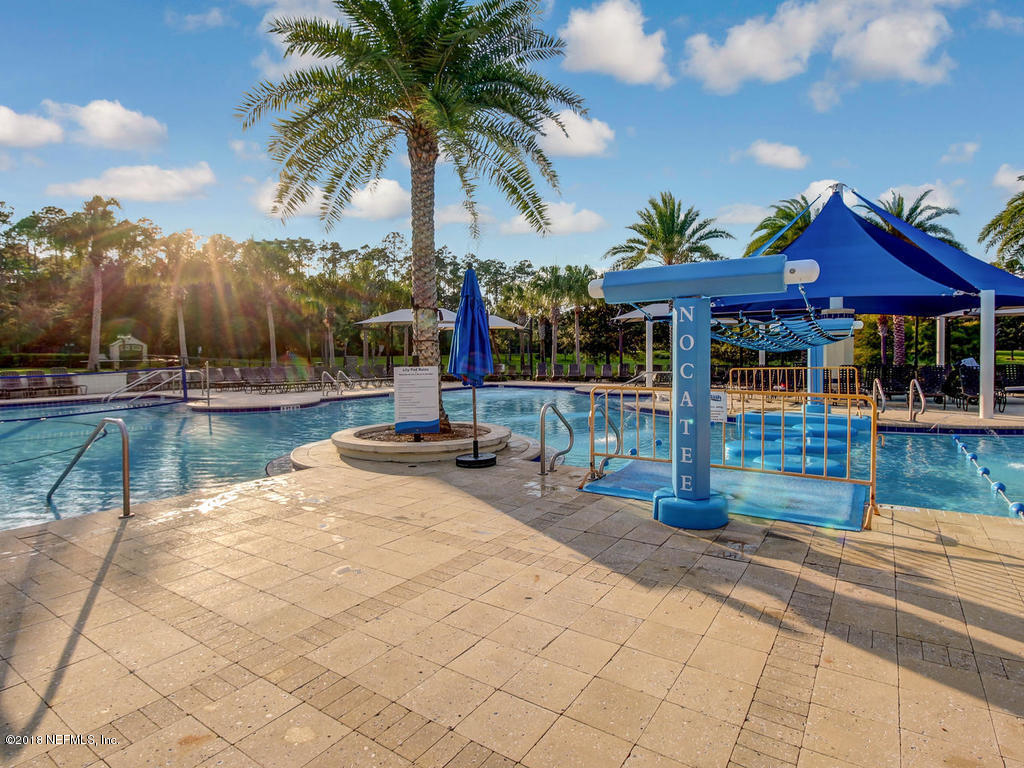 144 Maiden Terrace Ponte Vedra, FL 32081 - Photo 58 of 59 a view of a house with swimming pool and sitting area