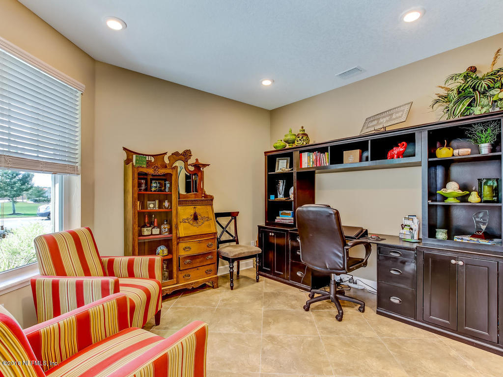 144 Maiden Terrace Ponte Vedra, FL 32081 - Photo 7 of 59 a view of a livingroom with workspace and a window