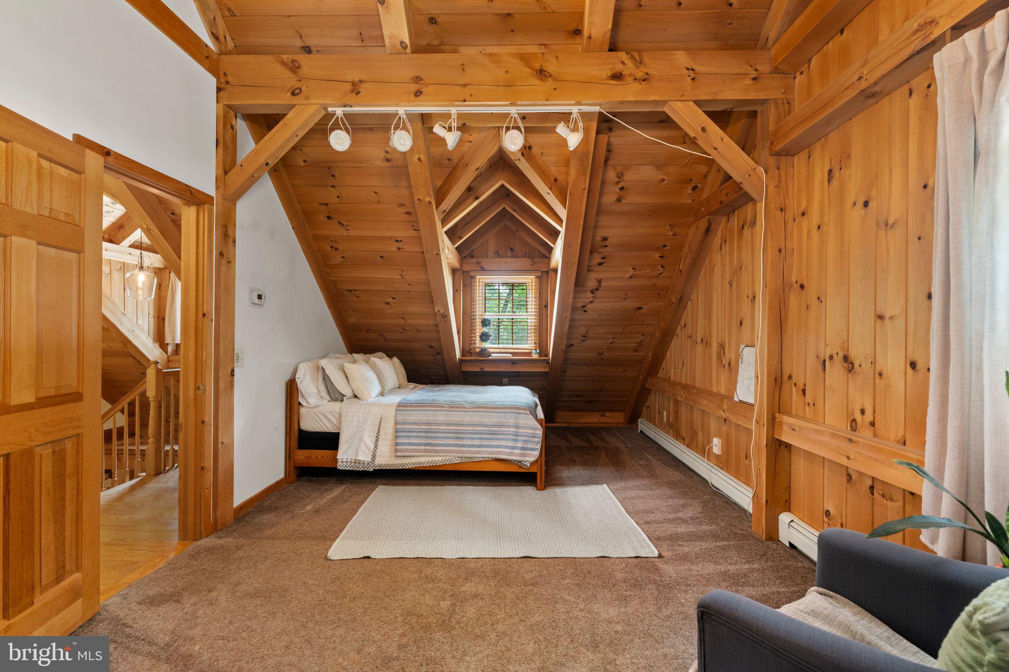 16 Dunhill Road Jackson, NJ 08527 - Photo 23 of 44 Cozy attic retreat with wooden charm.