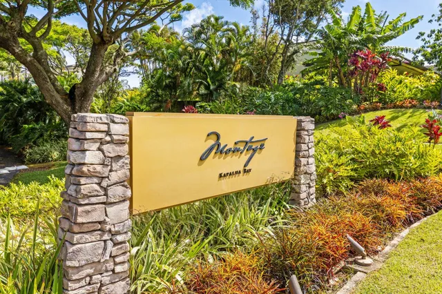 a view of a lake with a yard