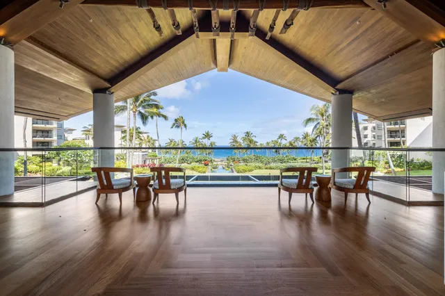 a view of a chairs and table in patio